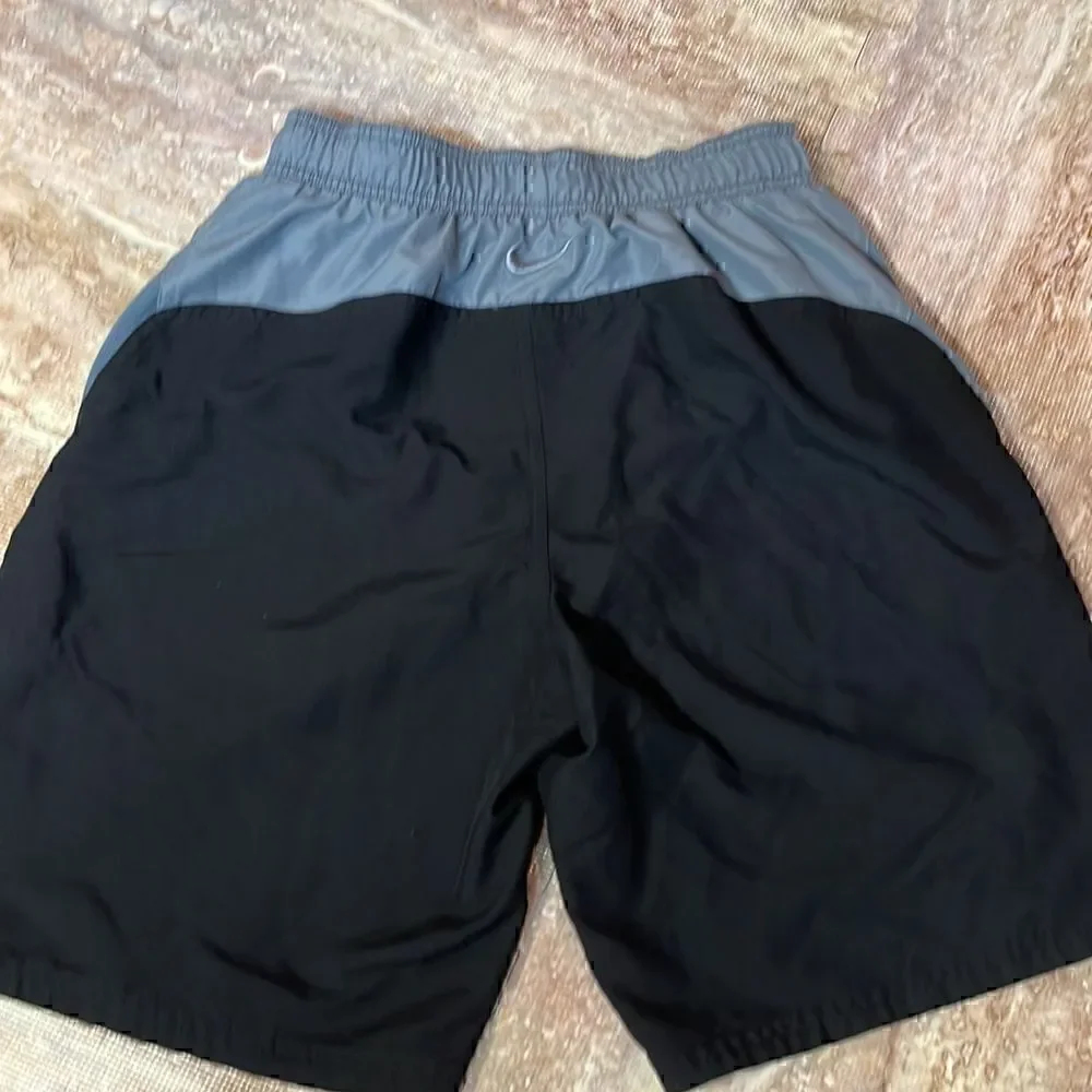 Nike men’s black/gray swim trunks. Size S.